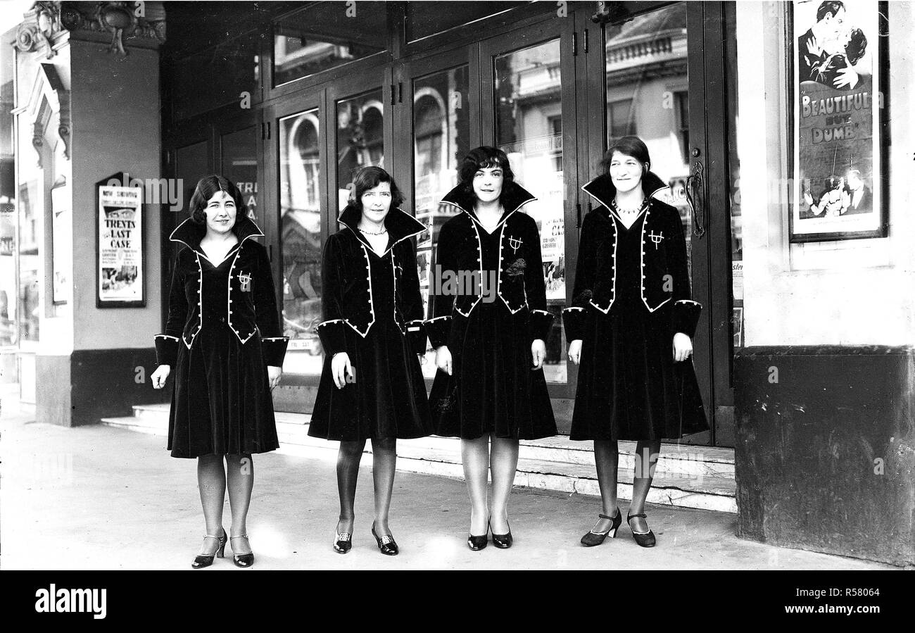 Usherettes standing in the doorway of the New Strand Theatre, Liverpool Street, Hobart (1930) - Mandatory Photo Credit: TAHO Stock Photo