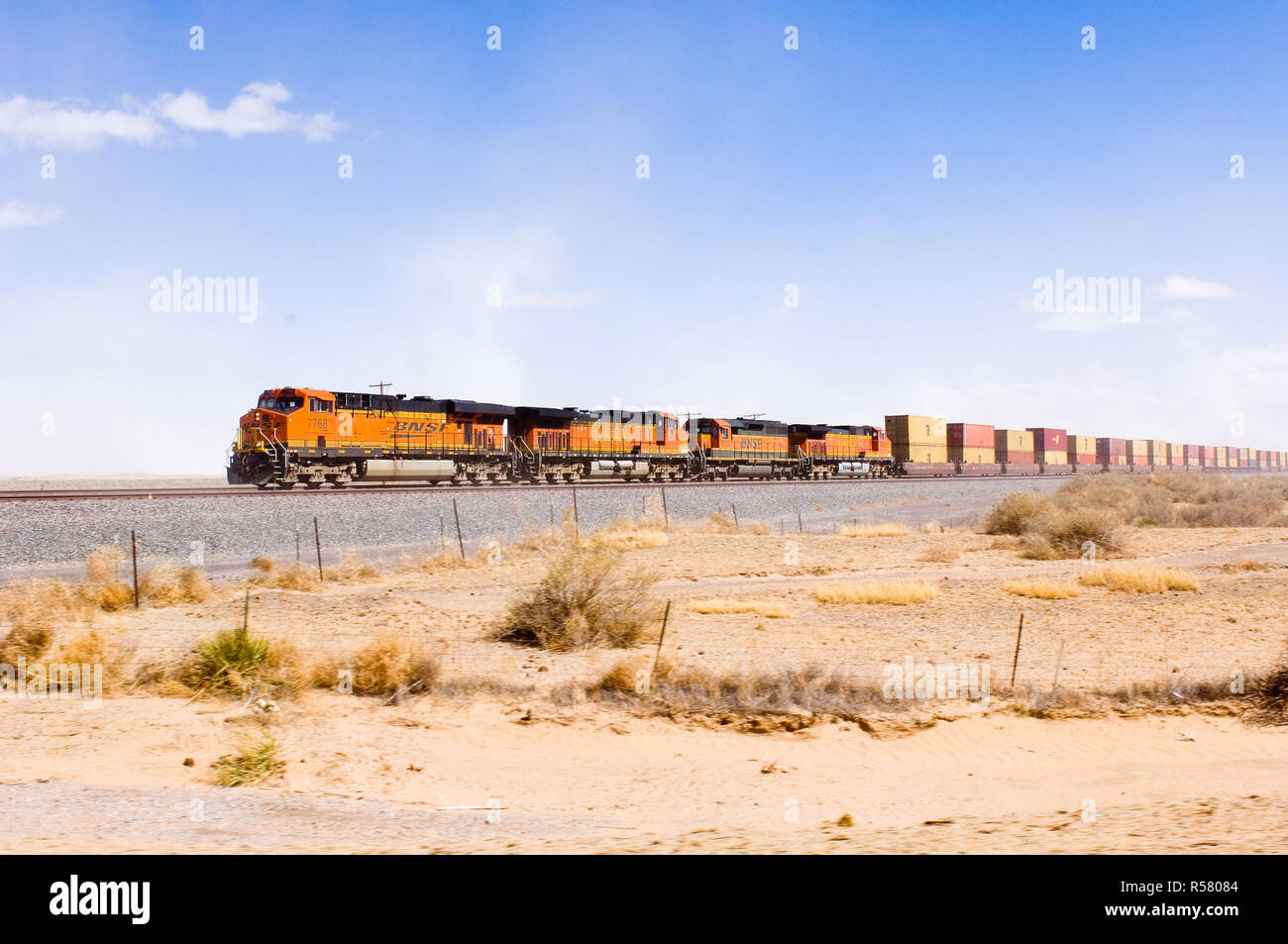 2006 Multiple BNSF freight train engines haul cars of shipping