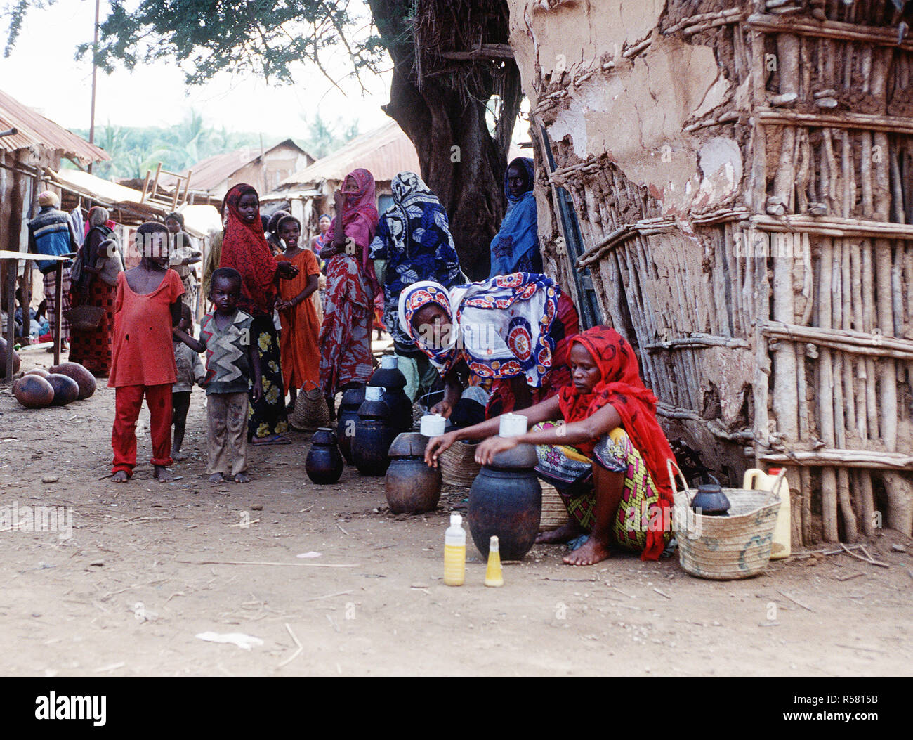 A Belgian soldier, in Somalia in support of OPERATION CONTINUE HOPE walks through a market. Stock Photo