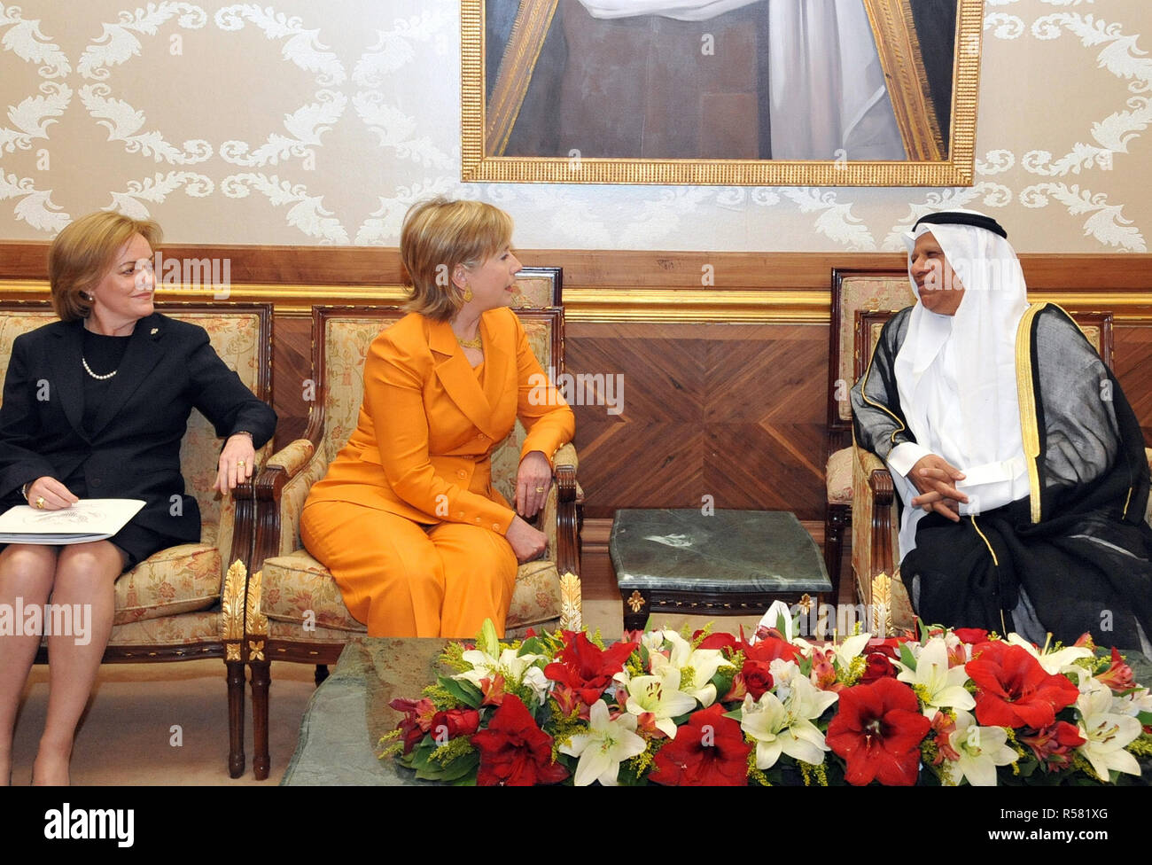 U.S. Secretary of State Hillary Rodham Clinton arrives in Kuwait to a welcome from Kuwaiti Ministry of Foreign Affairs Ambassador Ali Al-Sammak (left) and U.S. Ambassador to Kuwait Deborah K. Jones (left) Stock Photo