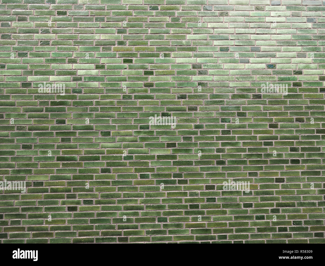 green brick wall background Stock Photo - Alamy