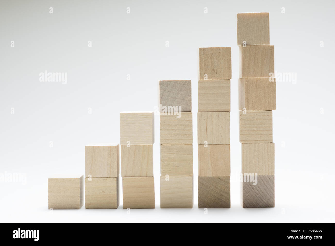 Business concept growth success process using wood cubes stacking up. Stock Photo