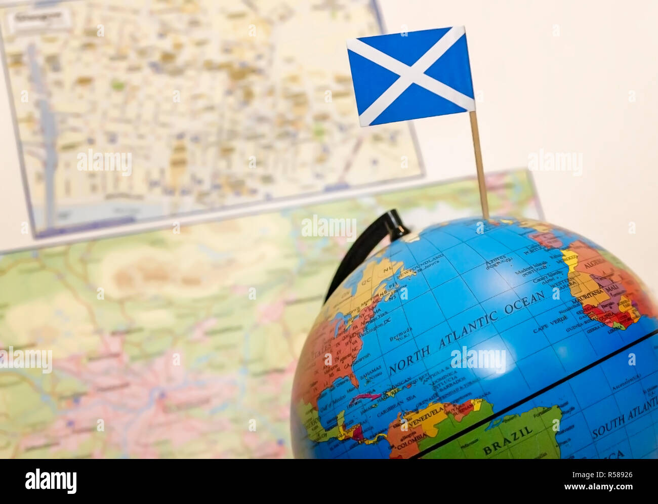 The Scotland flag is inserted in a globe and displayed with maps at the 34th annual Mobile International Festival, Nov. 17, 2018, in Mobile, Alabama. Stock Photo