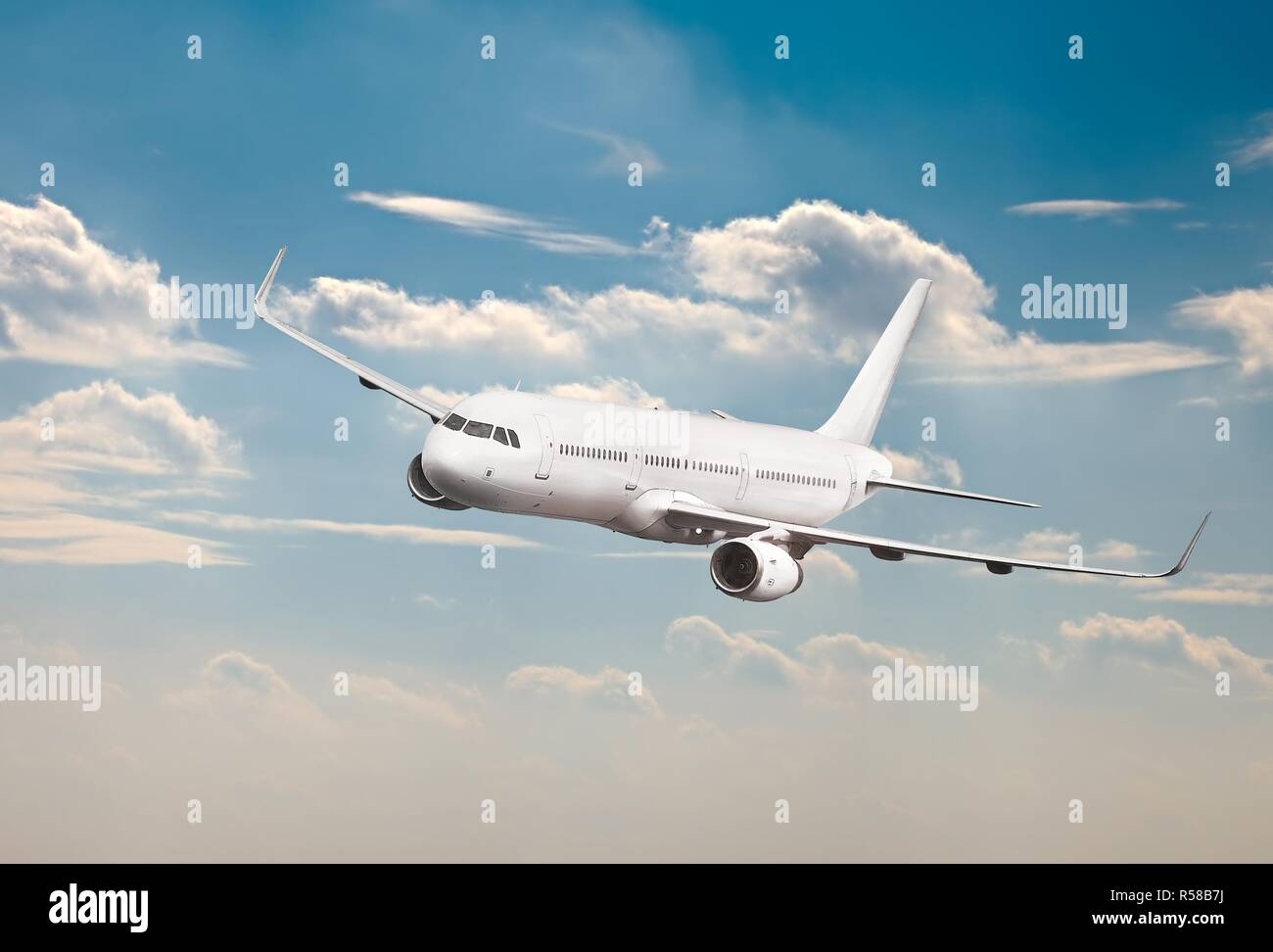 Passenger Aircraft Mid-air Stock Photo