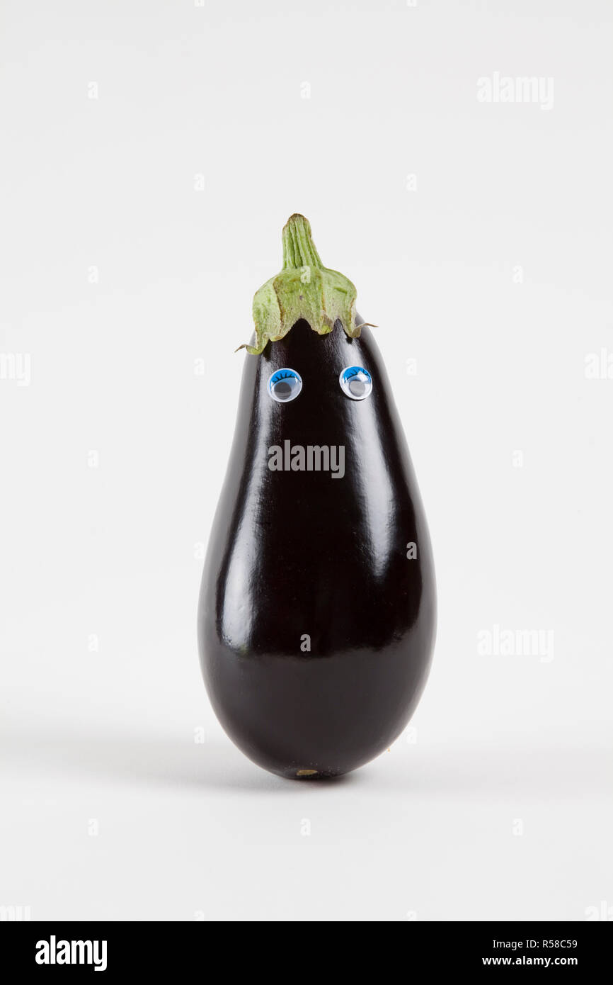 eggplant doll eyes back white Stock Photo Alamy