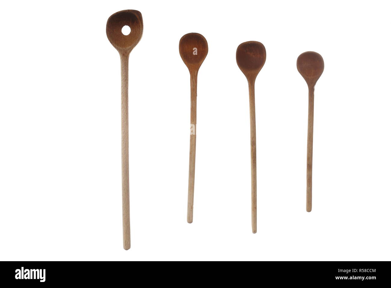 four different wooden spoons Stock Photo Alamy
