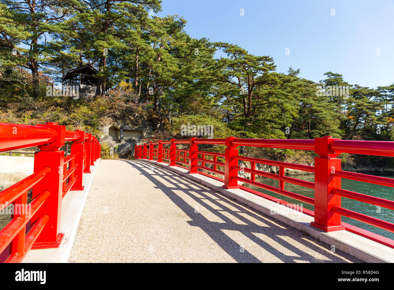 Red bridge cross to Fukuurajima Island Stock Photo - Alamy