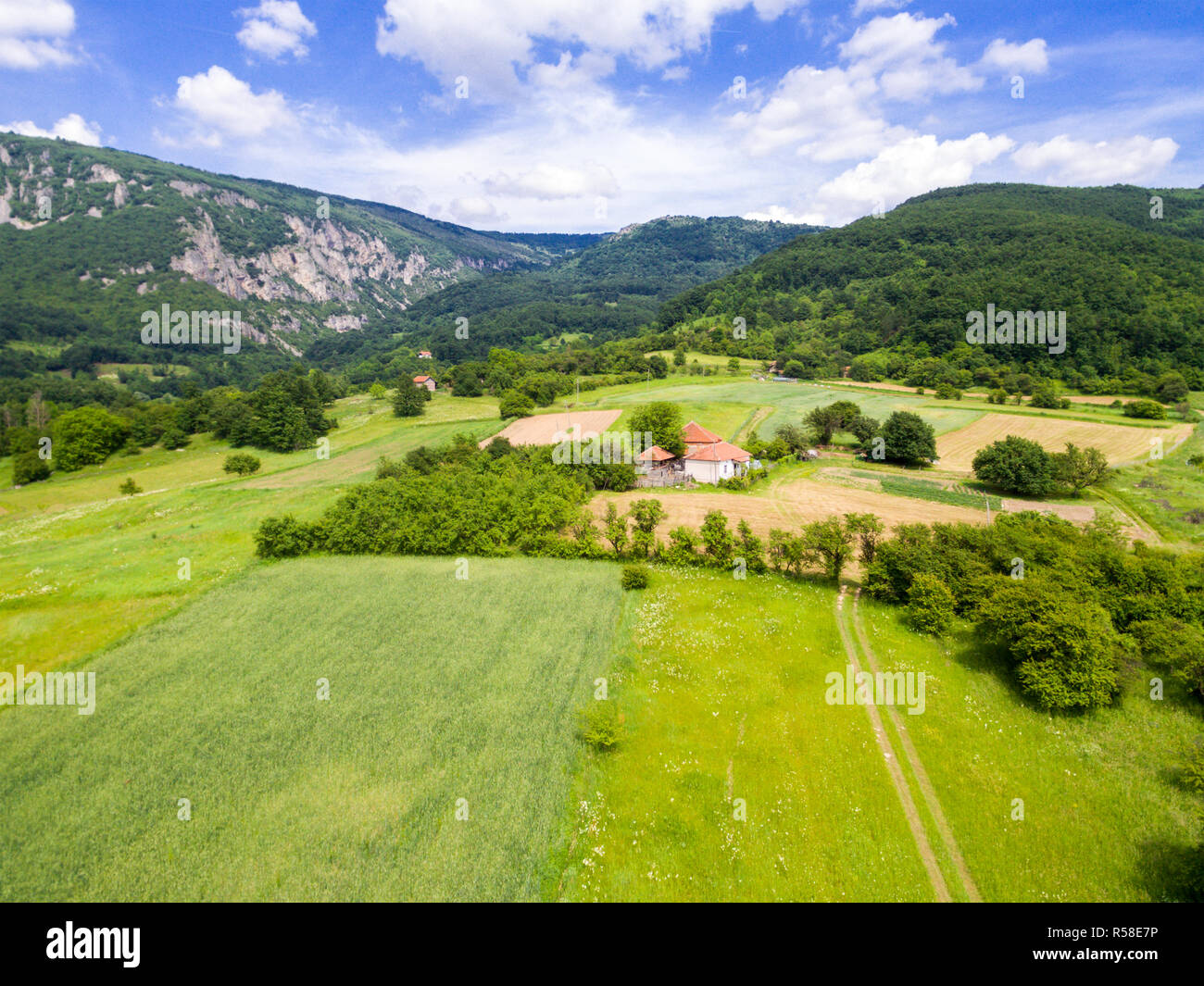 Aerial view of mountain green landscape. Highland hills and meadows