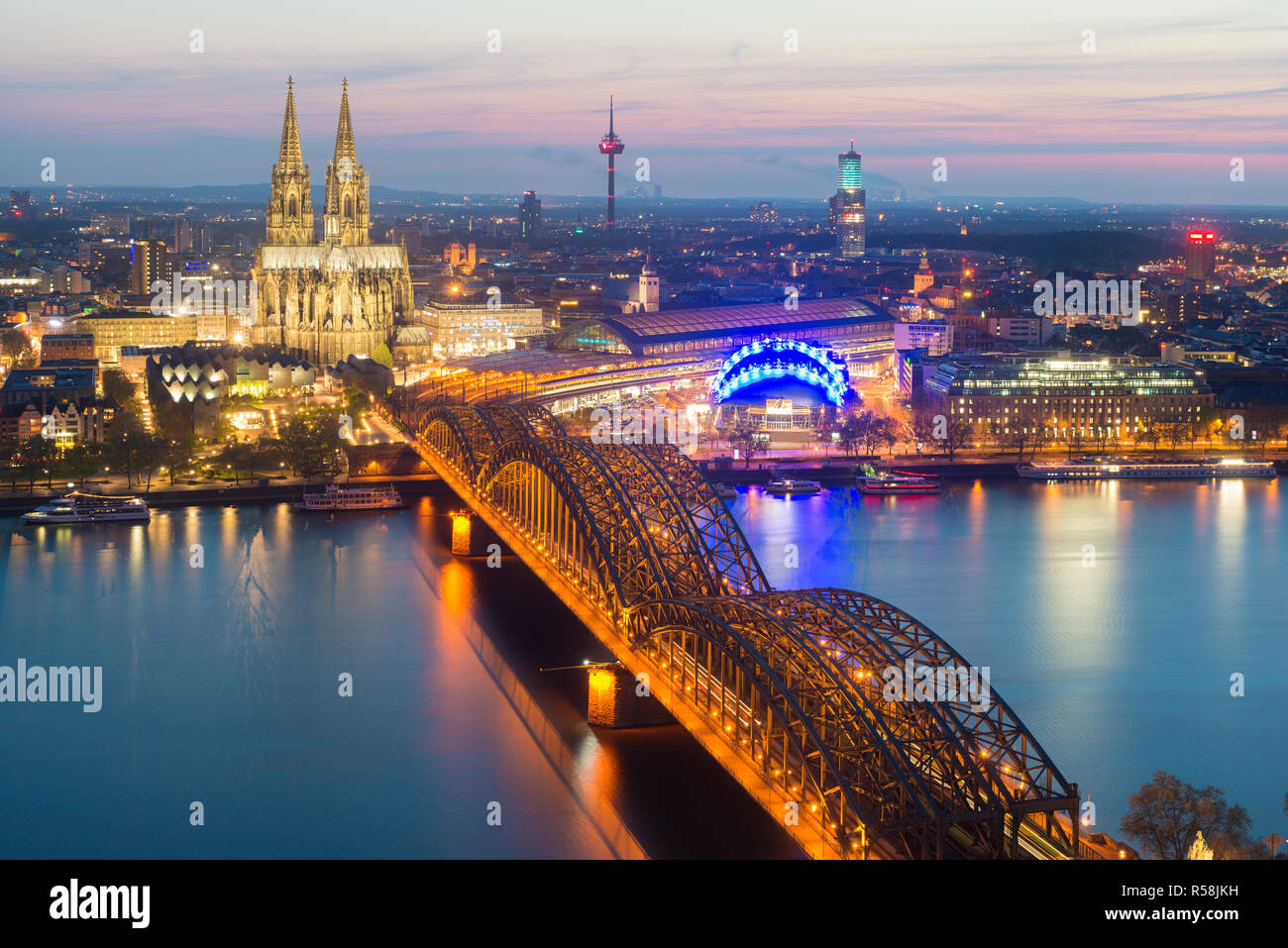 Image of Cologne with Cologne Cathedral during twilight blue hour in Germany. Stock Photo