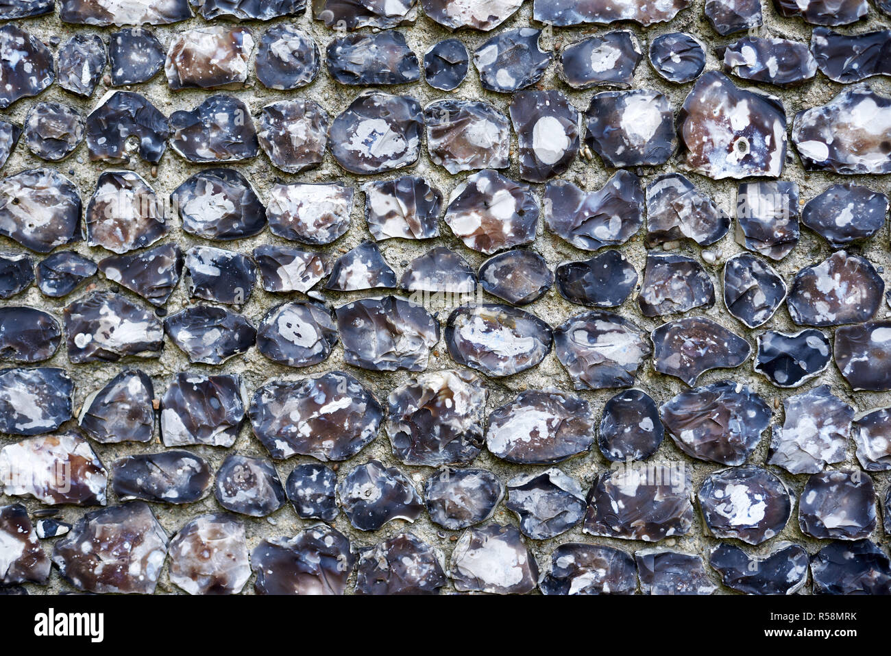 Granite stone wall background texture Stock Photo - Alamy