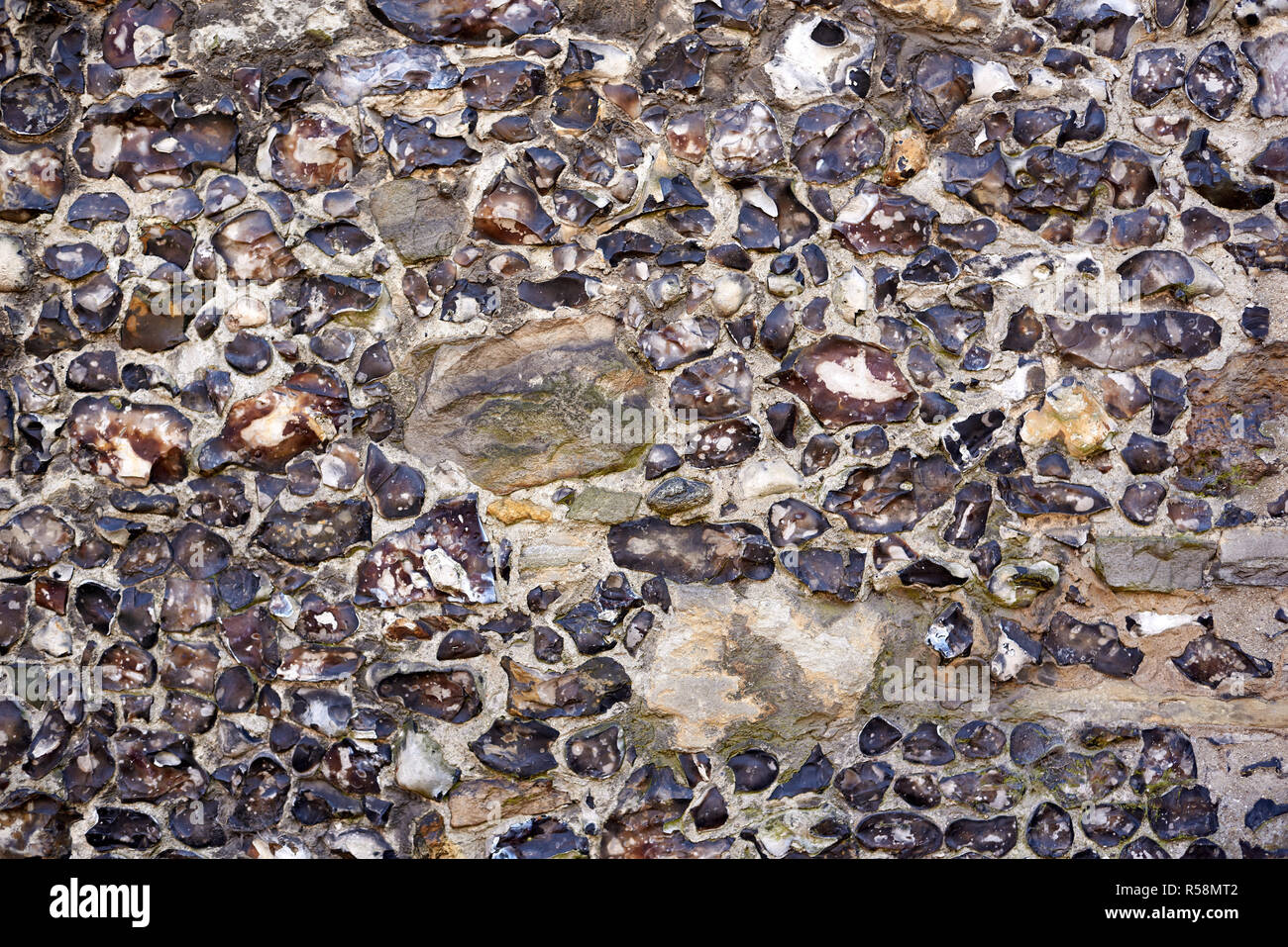 Granite stone wall background texture Stock Photo - Alamy