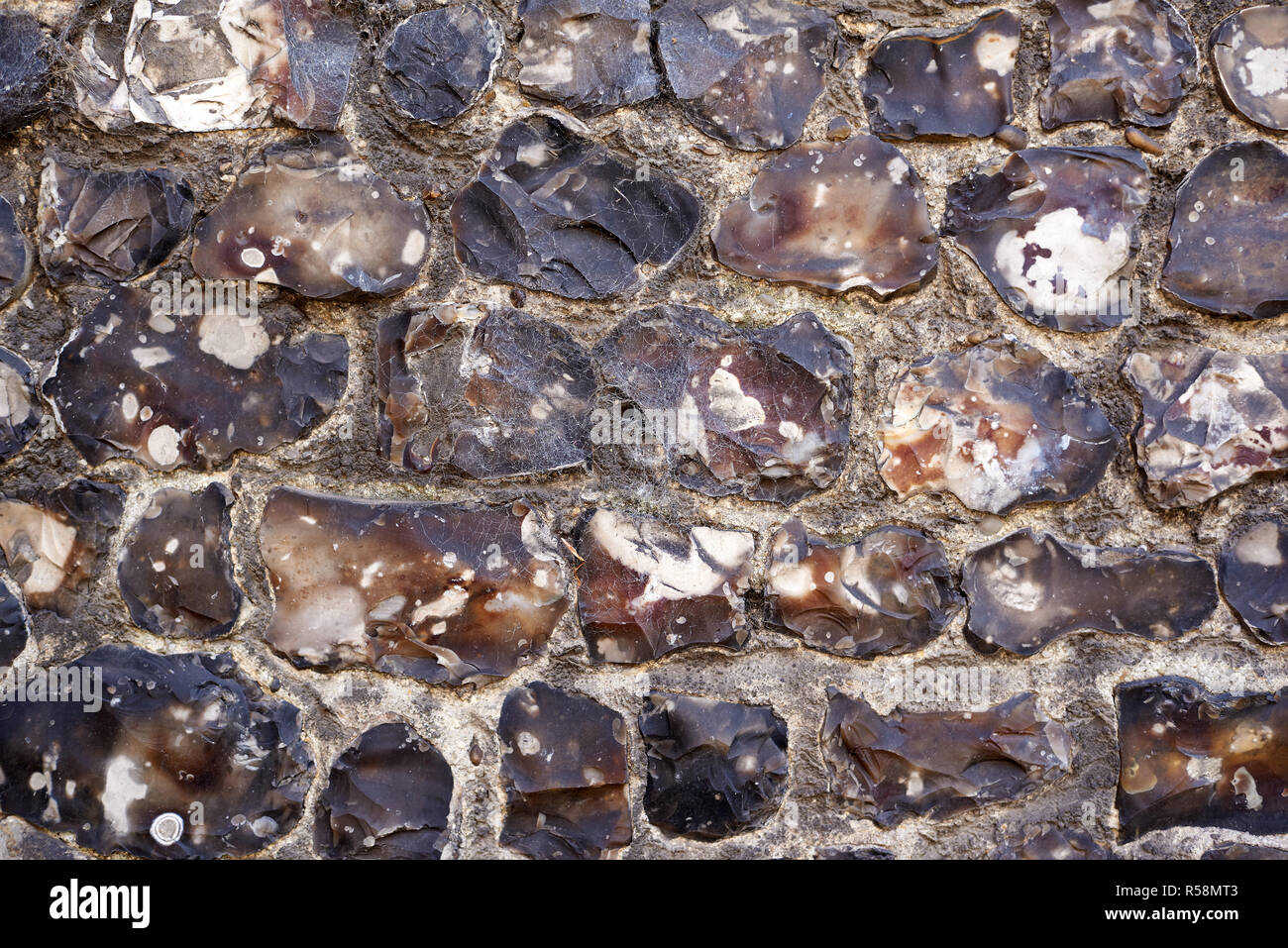 Granite stone wall background texture Stock Photo - Alamy