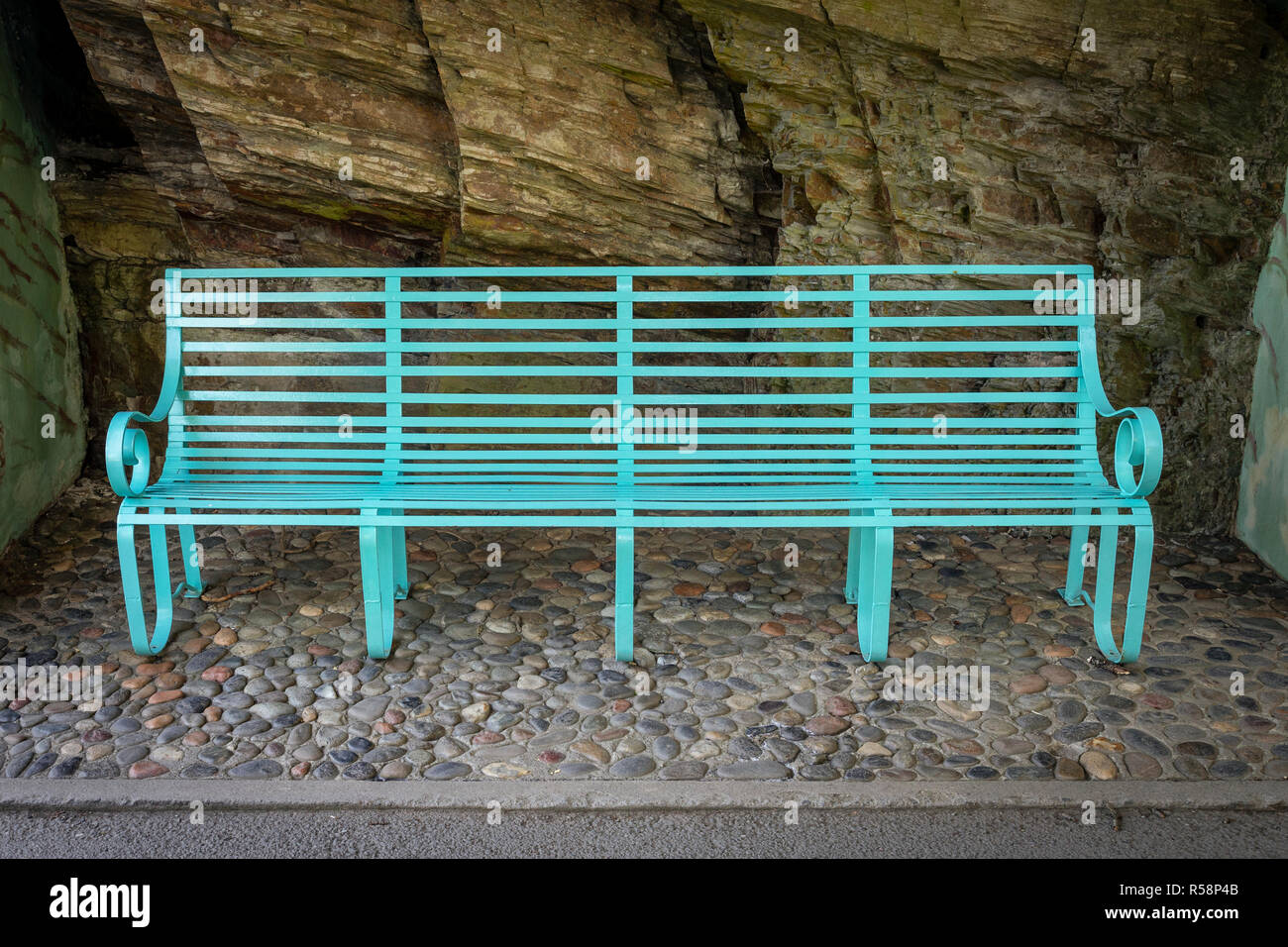 Painted steel bench at Portmeirion, North Wales Stock Photo