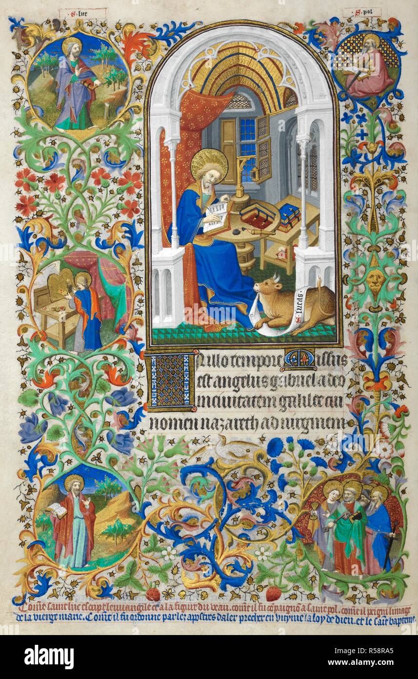 Gospel extracts. St. Luke writing, with his symbol, an ox. Text, with decorated initial. Decorated borders with marginal scenes from the saint's life. Bedford Hours. Paris; 1414-1423. Source: Add. 18850, f.20v. Language: Latin and French. Author: Workshop of the Master of the Duke of Bedford. Stock Photo