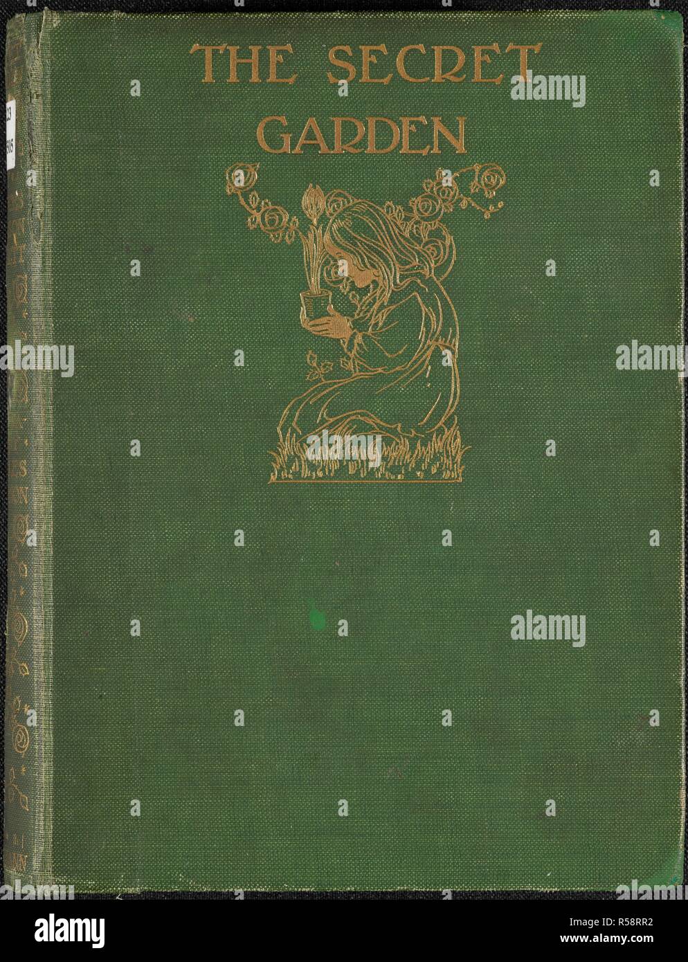 Green cover for the children's story, 'The Secret garden'. The secret garden / by Frances Hodgson Burnett ; illustrated by Charles Robinson. London : William Heinemann, 1911. Source: RB.23.a.35505 Front binding/cover. Stock Photo