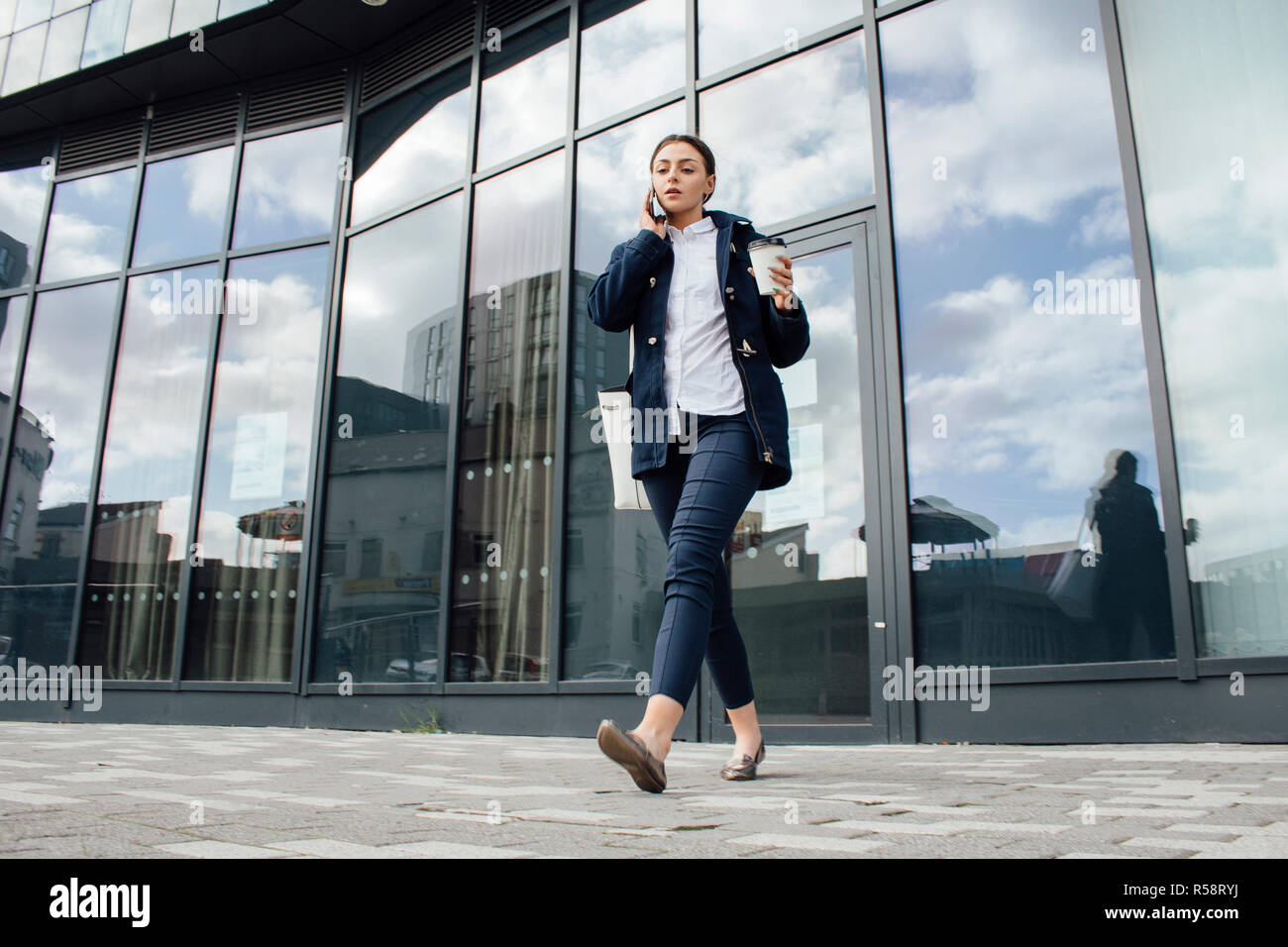 Businesswoman Leaving Work Stock Photo