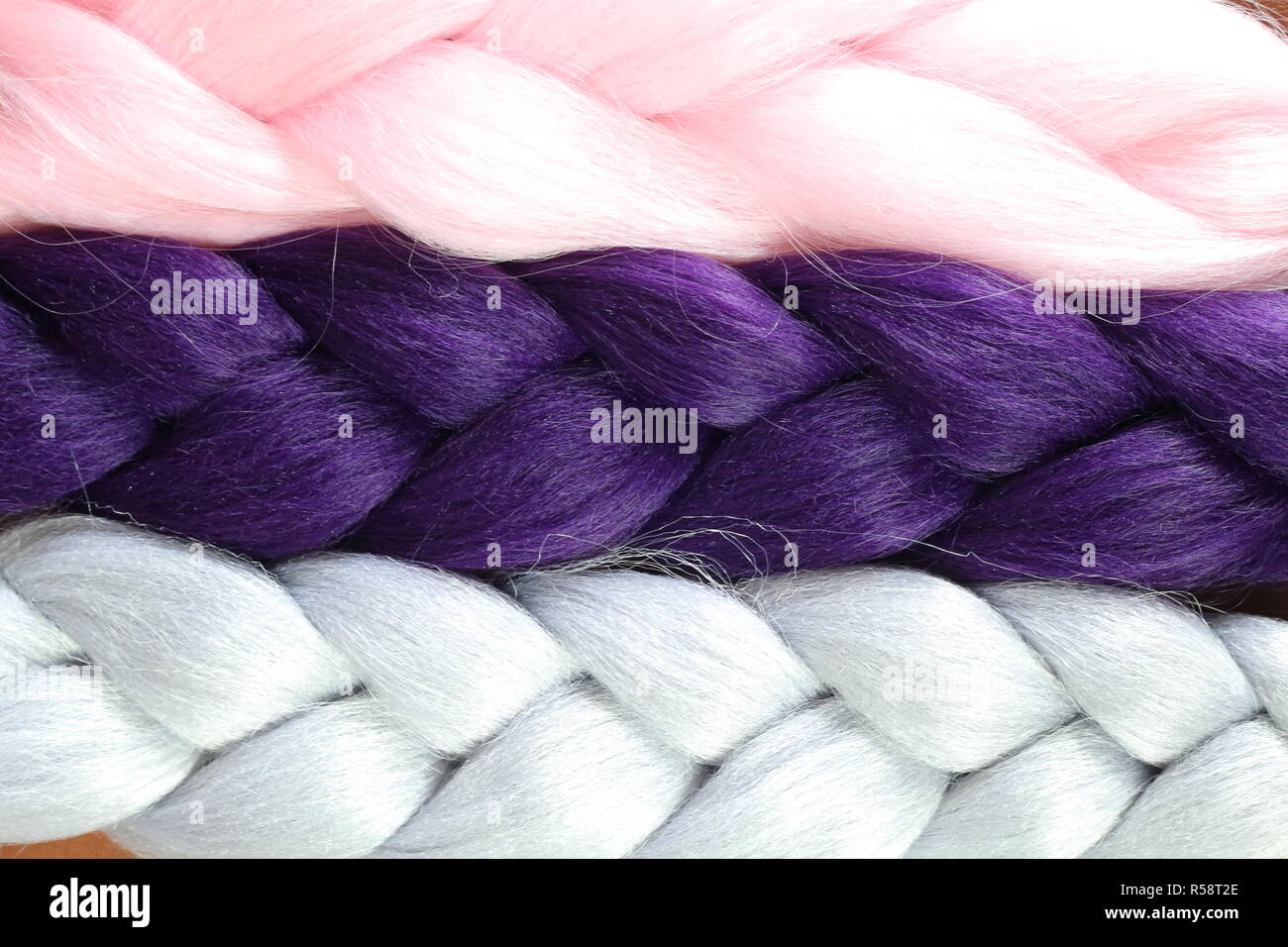 Artificial material for weaving in braids, synthetic hair Stock Photo