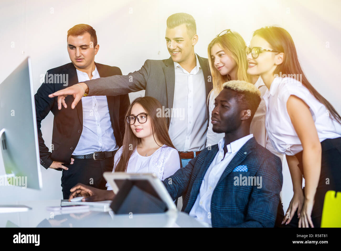 Company employees working in software development and designer office Stock Photo
