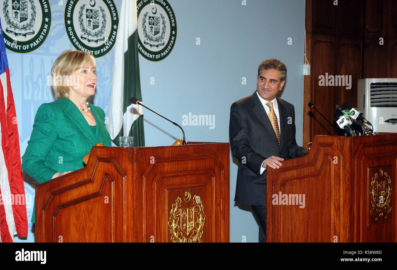 2009 - U.S. Secretary of State Hillary Rodham Clinton addresses a joint press conference alongside Pakistani Foreign Minister Shah Mahmood Qureshi, at the Ministry of Foreign Affairs in Islamabad, Stock Photo