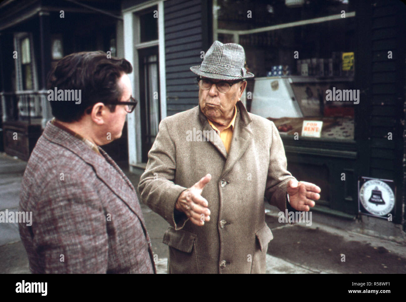 1973 Boston - A 92 Year Old man from Lovell Street Tells his neighbor of Nearby Neptune Road How Airplane Vibrations Twice Knocked Over His Telephone Stock Photo