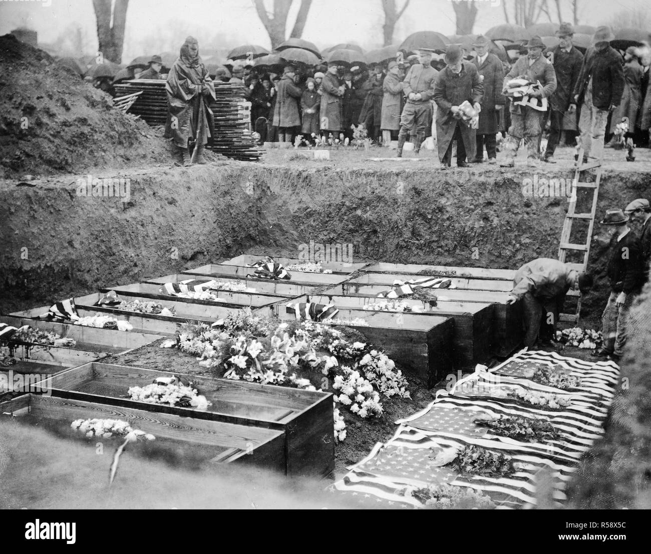 Destruction by Enemy in U.S. Burying the unidentified victims of the