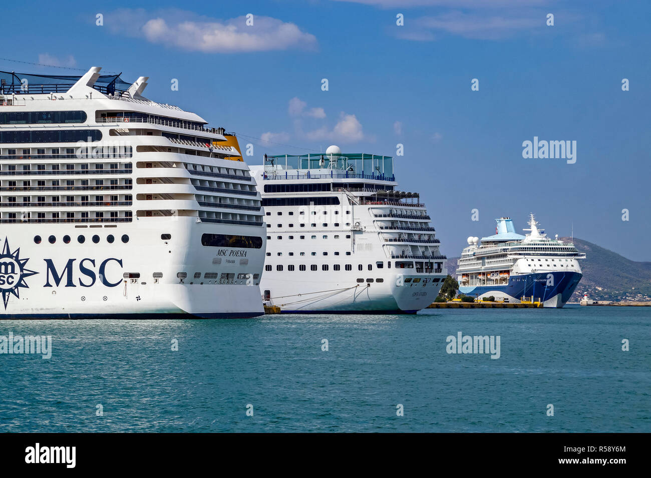 Cruise liners MSC Peosia, Costa Riviera and Marella Discovery 2 in port of Piraeus Athens Greece Europe Stock Photo