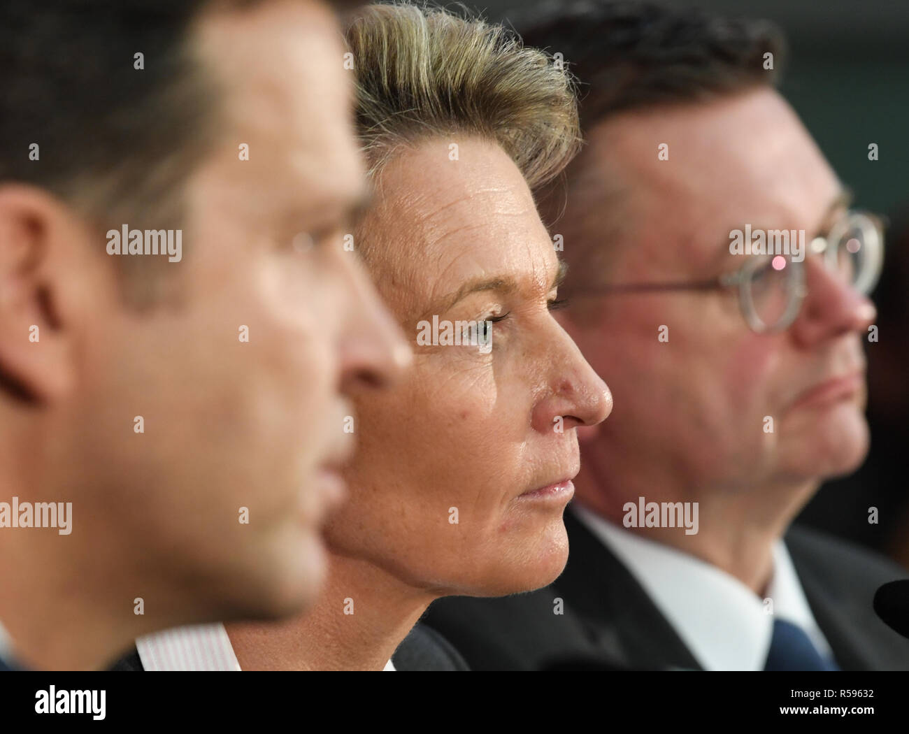 30 November 2018, Hessen, Frankfurt/Main: Oliver Bierhoff (l), DFB Director National Teams, and Reinhard Grindel, President of the German Football Association (DFB), will take part in the press conference to present Martina Voss-Tecklenburg, the new national coach of the women's national team, at the DFB headquarters. Voss-Tecklenburg was previously coach of the Swiss women's national team and is the successor to Horst Hrubesch. Photo: Arne Dedert/dpa Stock Photo