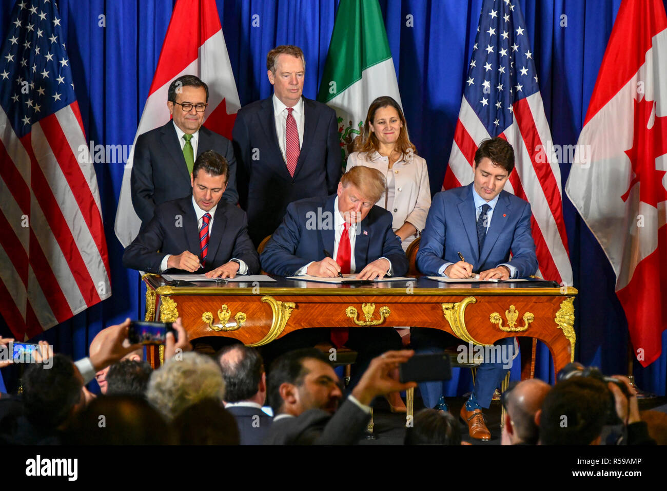 U.S. President Donald Trump, center, Canadian Prime Minister Justin Trudeau, right, and Mexican President Enrique Pena Neto, left, during a signing ceremony for the new NAFTA trade agreement called USMCA November 30, 2018 in Buenos Aires, Argentina. Stock Photo