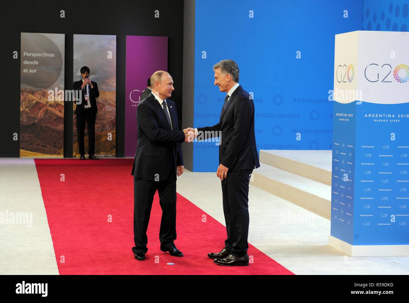 Buenos Aires, Argentina. 30th Nov, 2018. Argentine President Mauricio Macri, right, welcomes Russian President Vladimir Putin at the start of the G20 Summit meeting at the Costa Salguero Center November 30, 2018 in Buenos Aires, Argentina. Credit: Planetpix/Alamy Live News Stock Photo