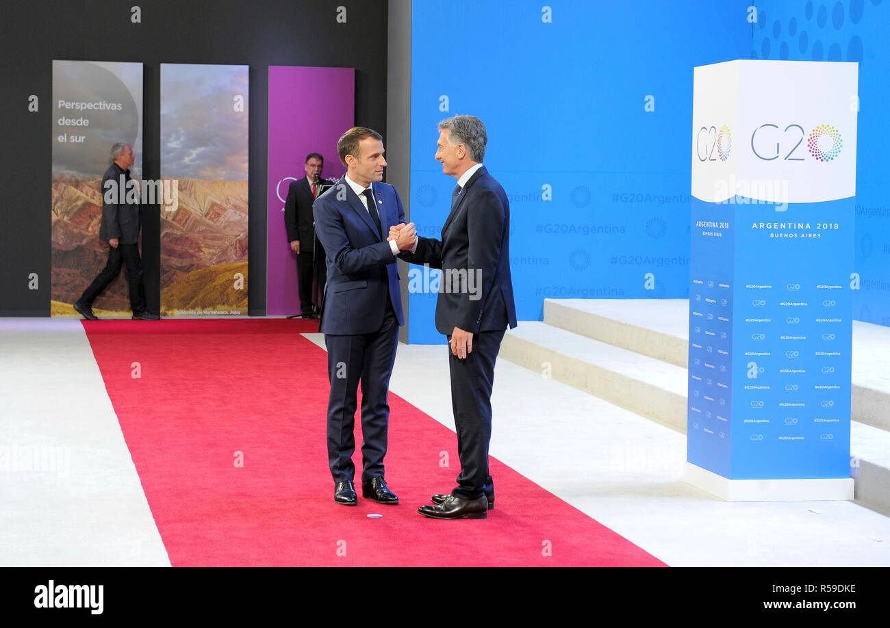Buenos Aires, Argentina. 30th Nov, 2018. Argentine President Mauricio Macri, right, welcomes French President Emmanuel Macron at the start of the G20 Summit meeting at the Costa Salguero Center November 30, 2018 in Buenos Aires, Argentina. Credit: Planetpix/Alamy Live News Stock Photo