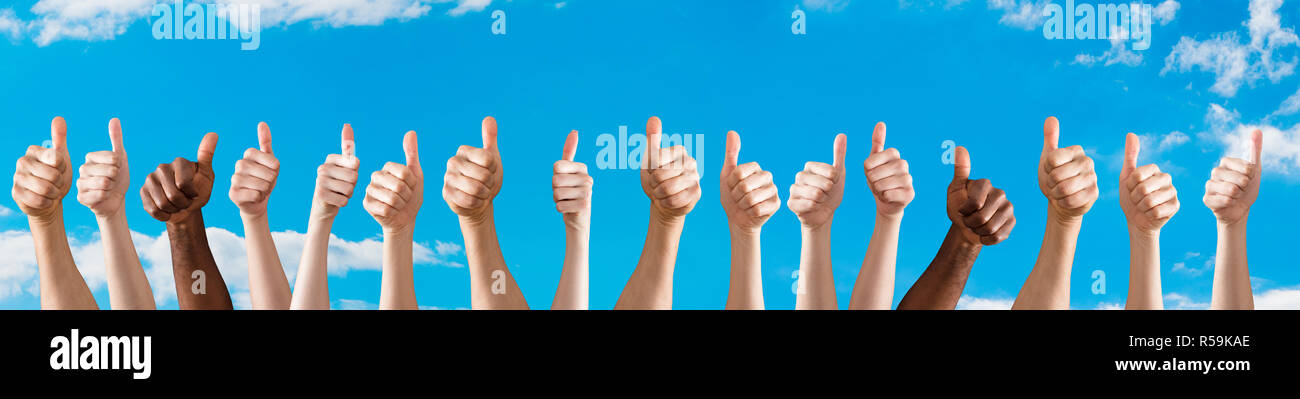 Diverse People Showing Thumb Up Sign Stock Photo