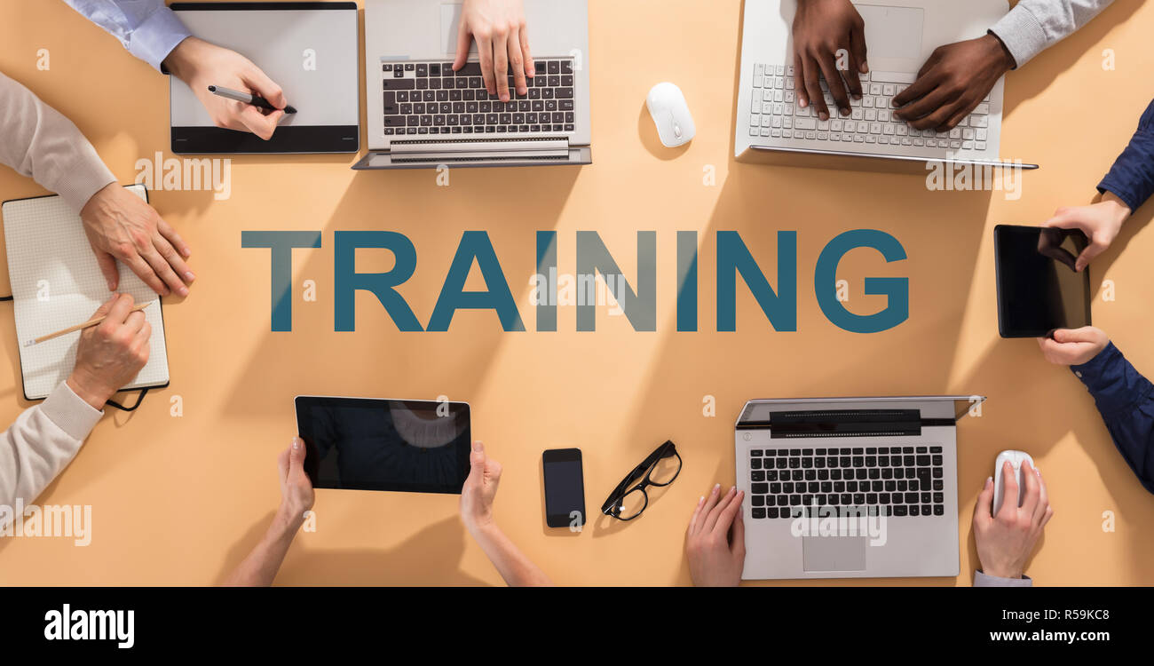 Training Text On Office Desk Stock Photo - Alamy