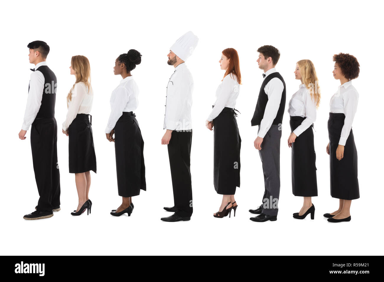 Multiracial Restaurant Staff Standing In Row Stock Photo