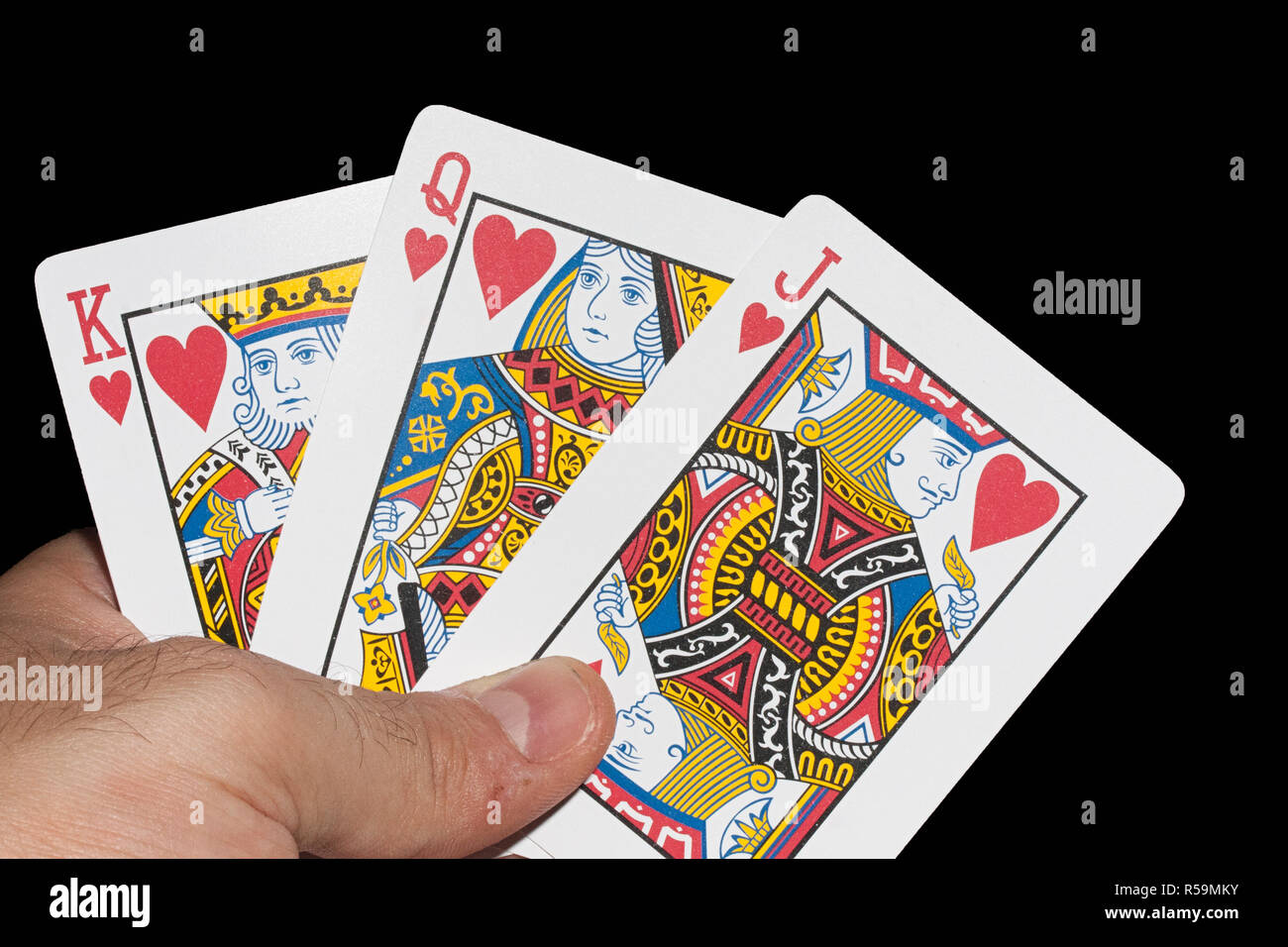 cards game hand hearts king queen jack Stock Photo - Alamy