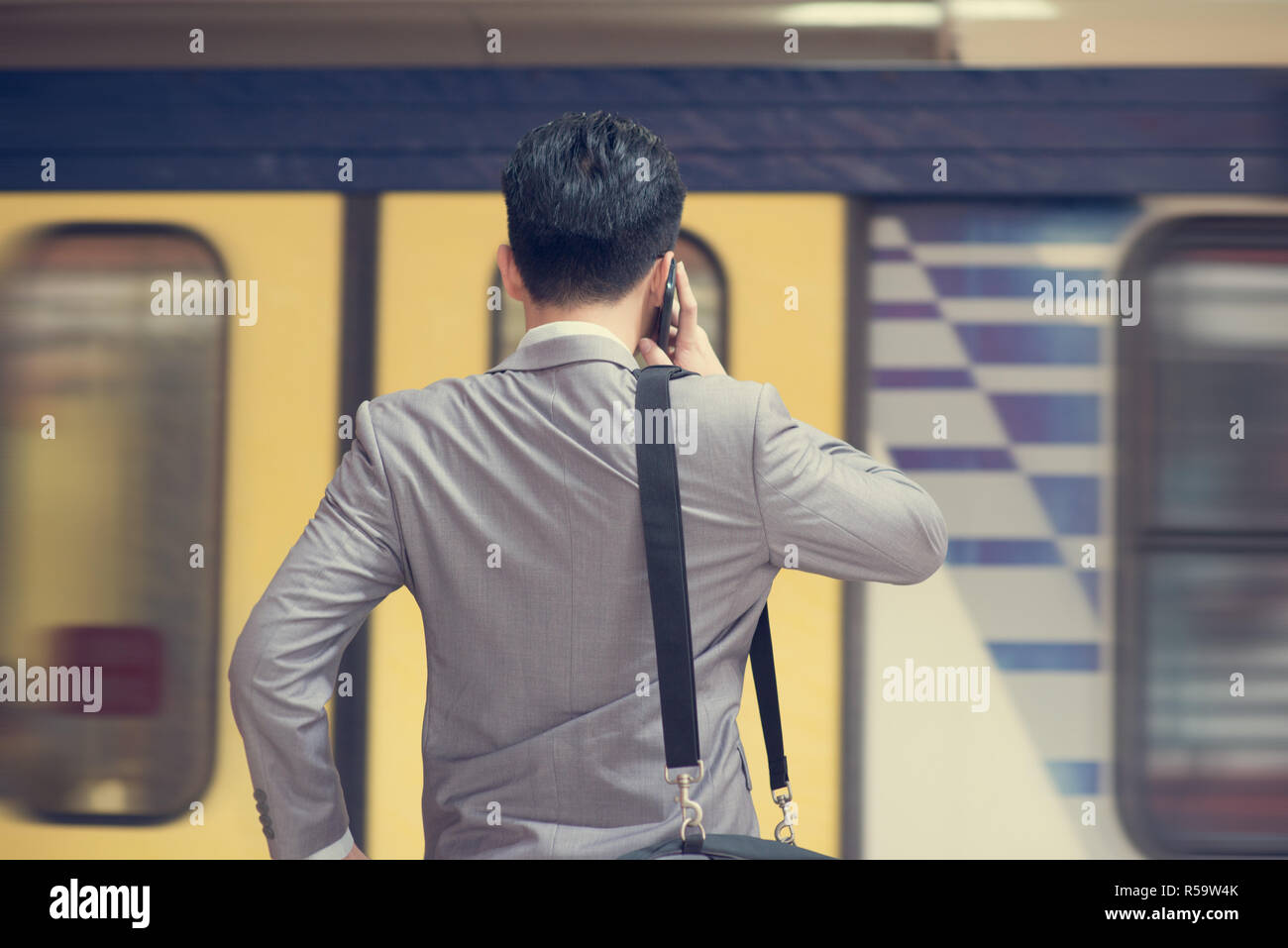 Train Phone Call Asian man talk phone train hi-res stock photography and images - Alamy