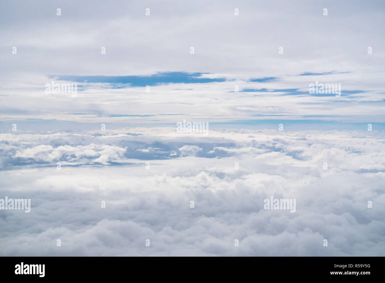 White fluffy clouds as seen from the airplane Stock Photo - Alamy