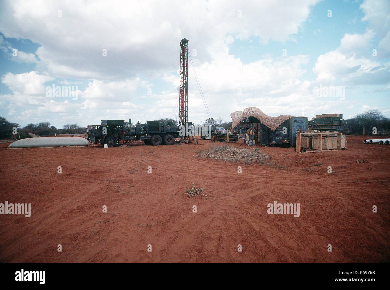 1993 - A view of a water drilling rig being operated by Naval Mobile Construction Battalion 1 (NMCB-1).  The well, near Bale Dogle, is intended to supply an old Soviet air base being used by U.S. and Moroccan personnel participating in the multinational relief effort OPERATION RESTORE HOPE. Stock Photo