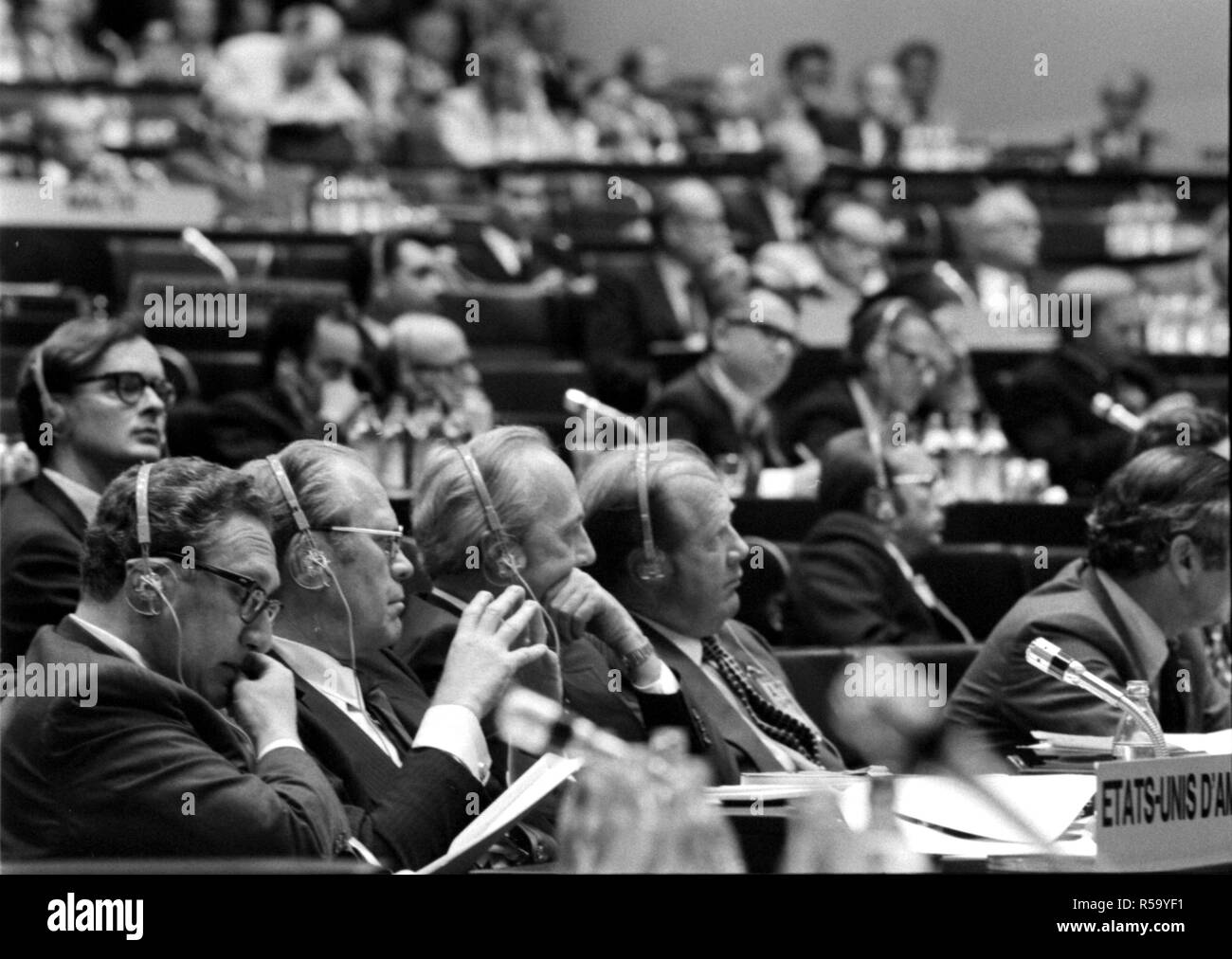 August 1975 - President Gerald R. Ford, Henry Kissinger, and the U.S. Delegation Listening to Discussions in Finlandia Hall during the Conference on Security and Cooperation in Europe (CSCE), in Helsinki, Finland Stock Photo