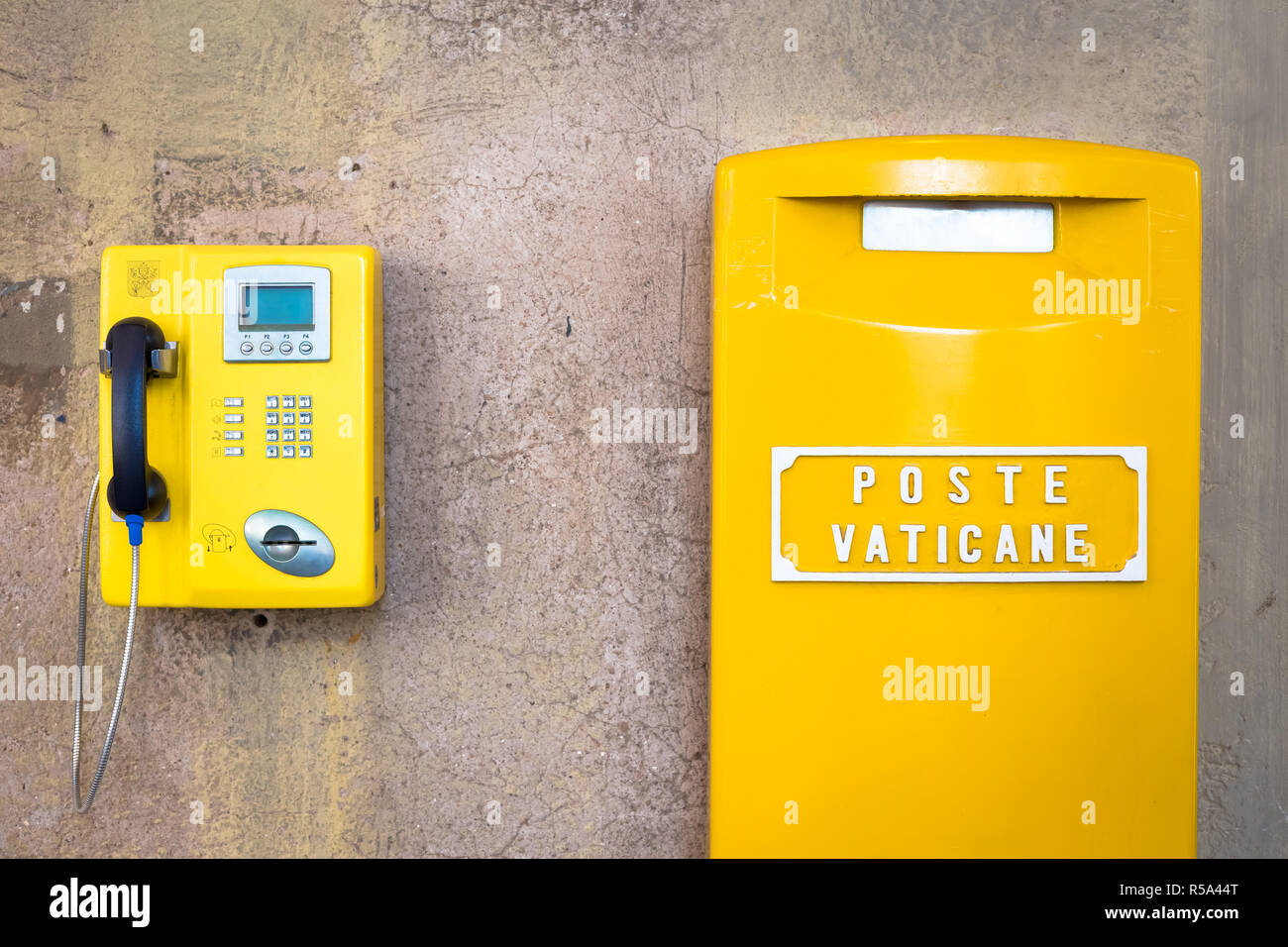 Detail of the traditional yellow post box in Vatican City, Rome Stock Photo