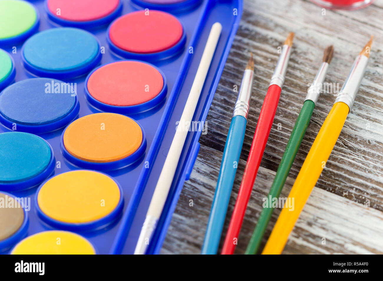 paint brushes on wooden background, special tools for creative people, back to school, education background Stock Photo
