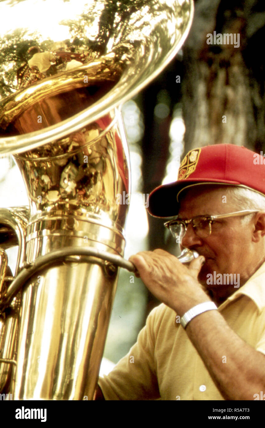 Senior Citizens Find That New Ulm, Minnesota, Is a Good Place to Retire ca. 1975 - senior citizen playing tuba Stock Photo