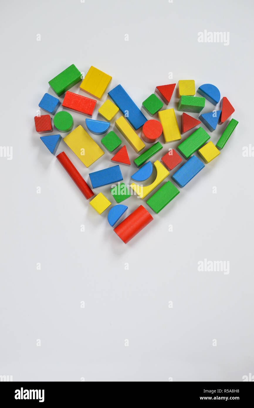 a heart composed of colorful wooden blocks Stock Photo