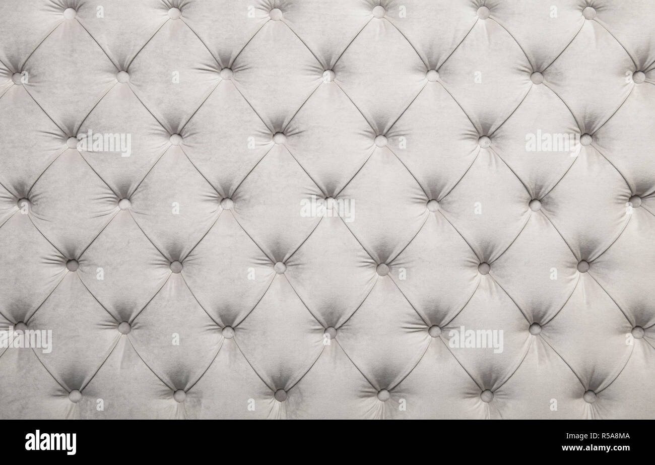 White capitone tufted fabric upholstery texture Stock Photo Alamy