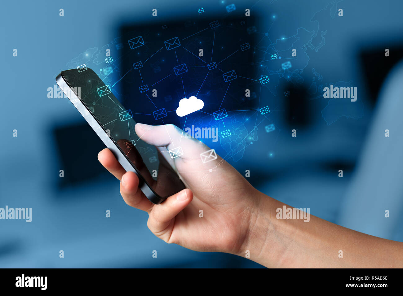 Hand using phone with cloud computing and online storage concept Stock ...