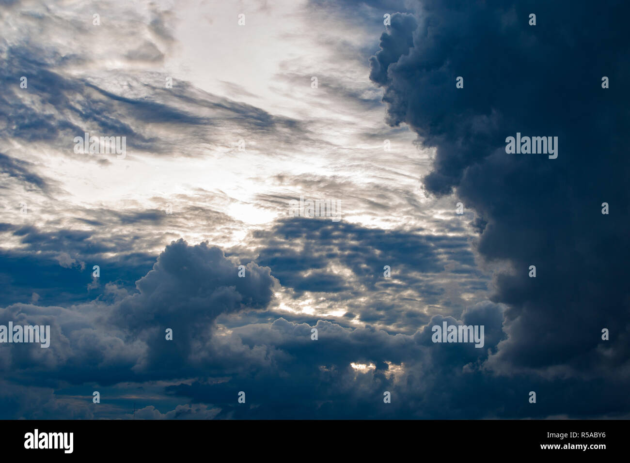 Gray storm clouds before sunset Stock Photo - Alamy