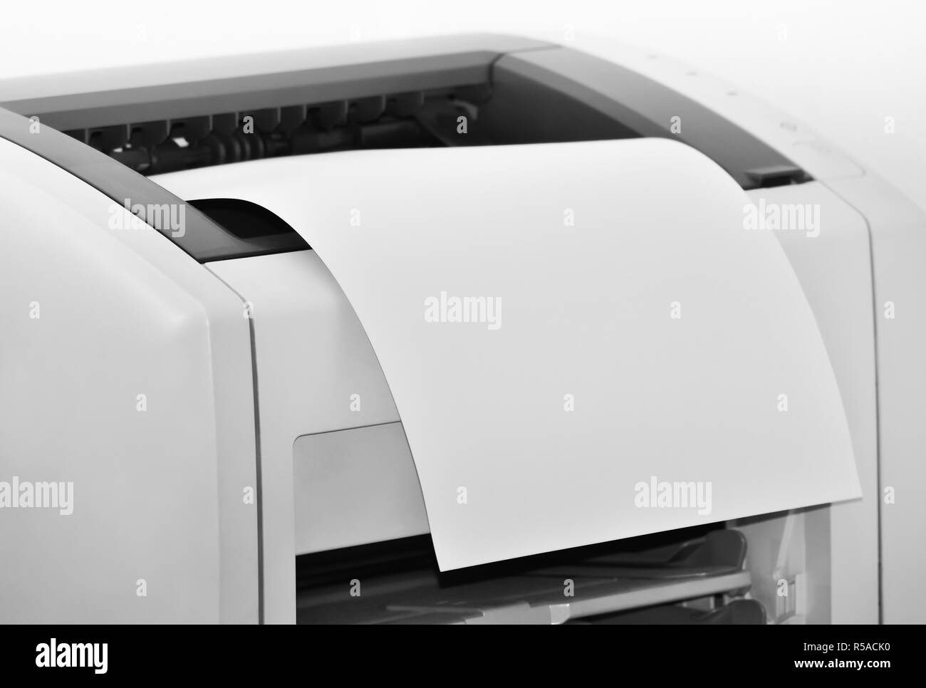 Laser printer and paper in black and white colors Stock Photo Alamy