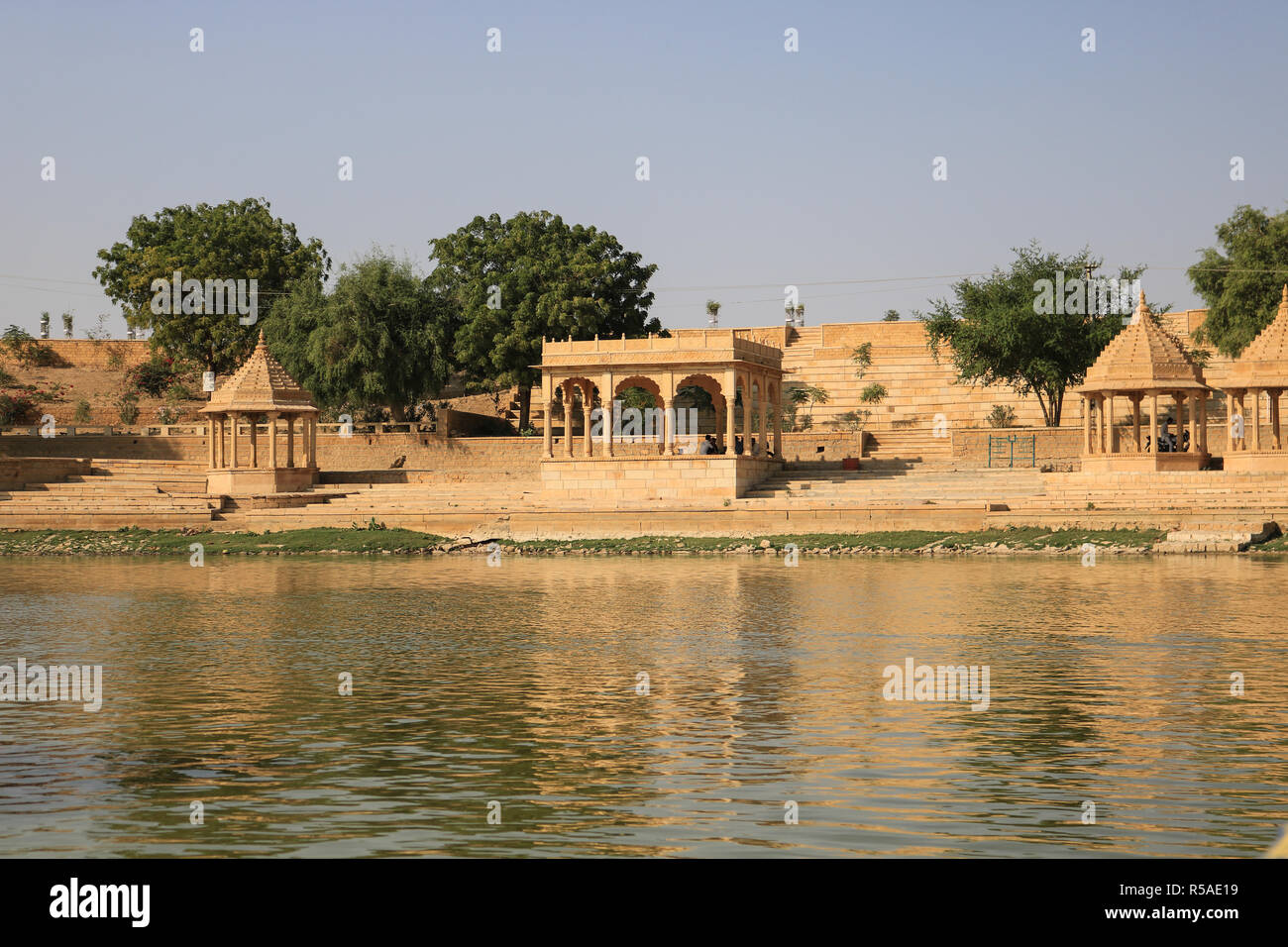 A man-made water reservoir (Gadisar Lake) in Jaisalmer. Constructed by the first ruler of Jaisalmer, Raja Rawal Jaisal, it is surrounded by temples an Stock Photo
