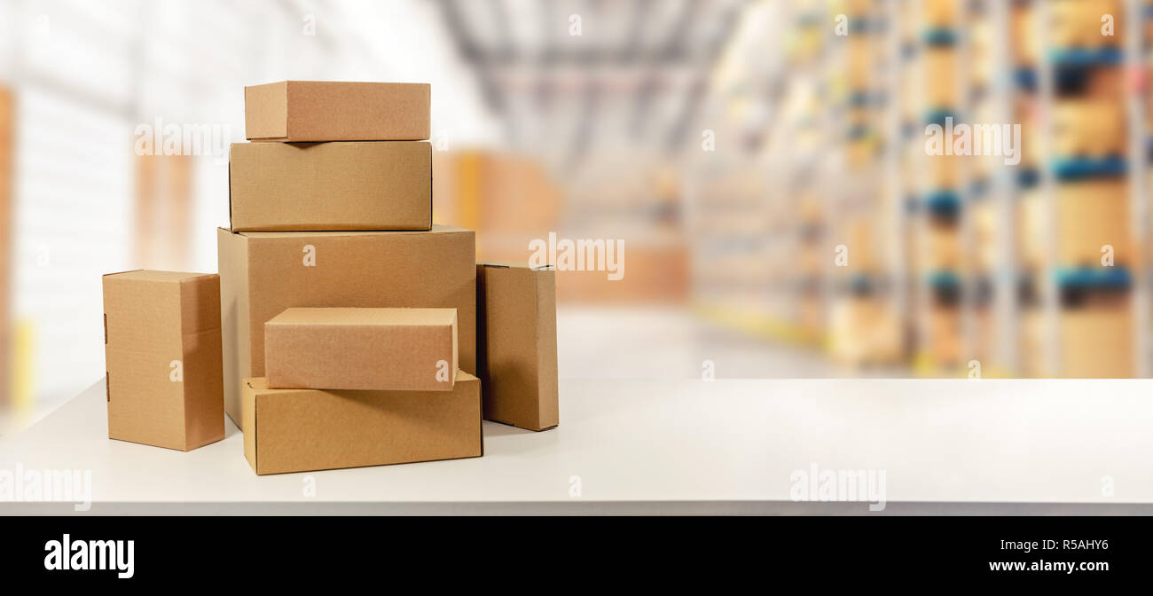 cardboard boxes in warehouse ready for transportation and delivery. copy space Stock Photo