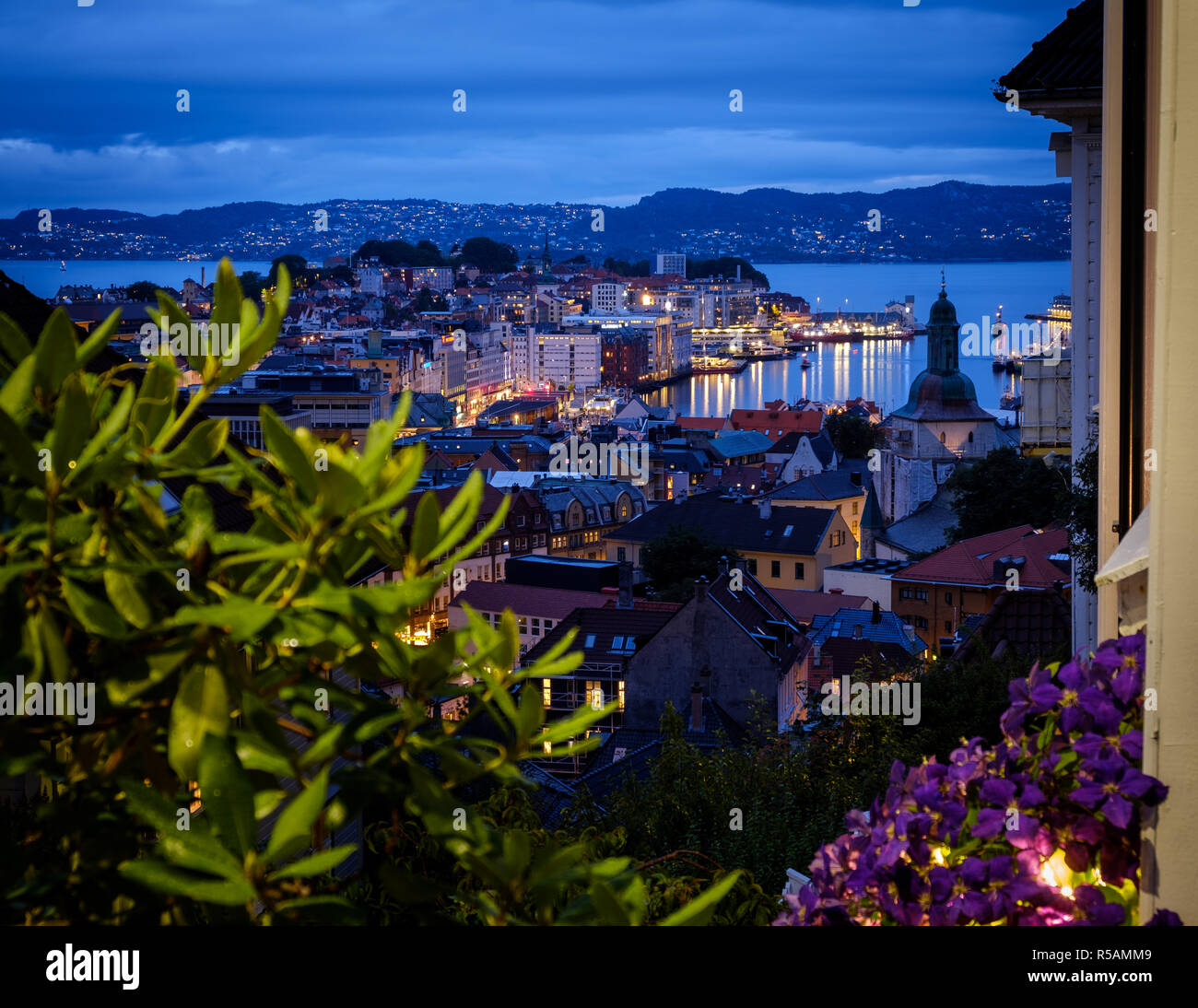 Scandinavian City Evening - View over Bergen's harbour, blue hour right after sunset, august 2018 Stock Photo