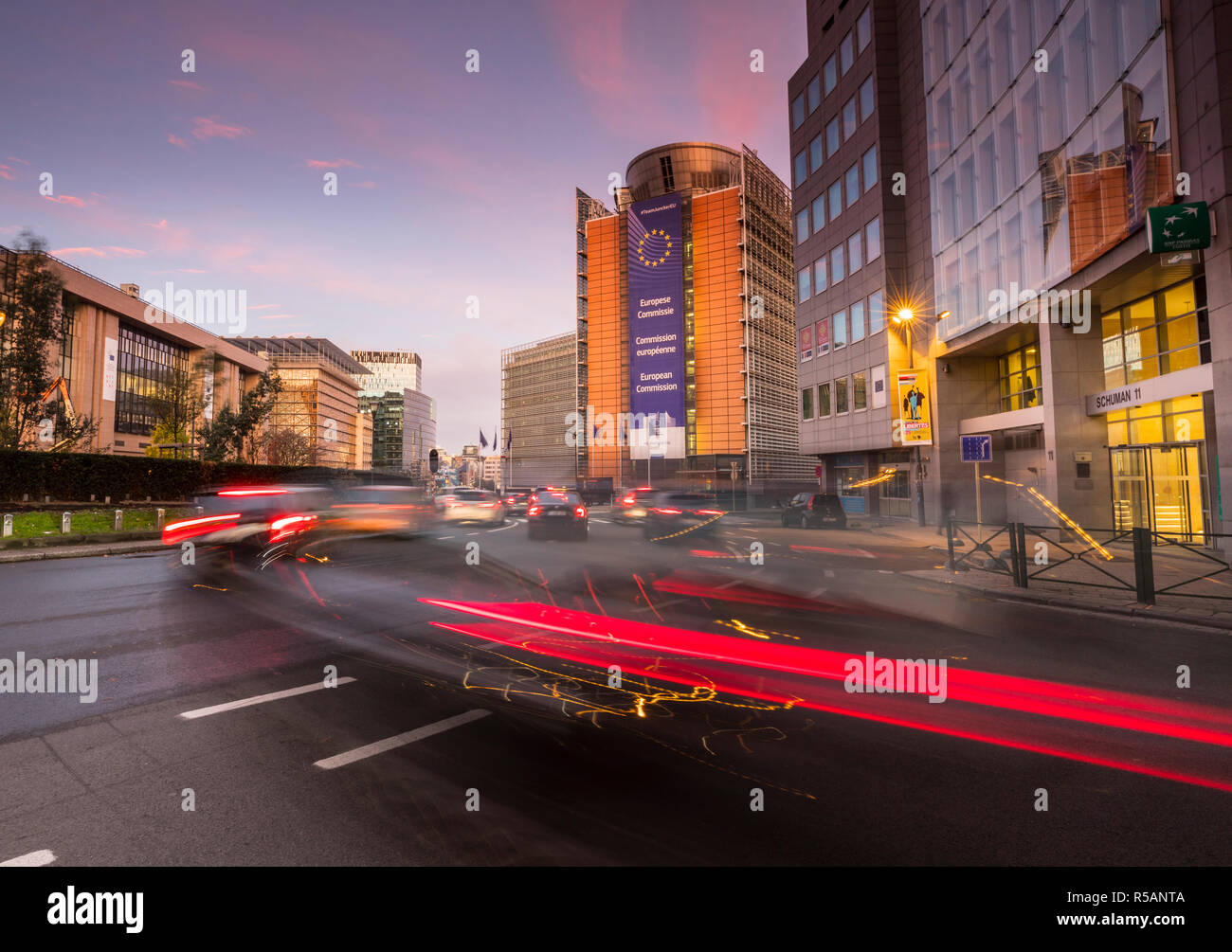 Traffic in the morning at European Commission building behind in Brusseles, Belgium Stock Photo